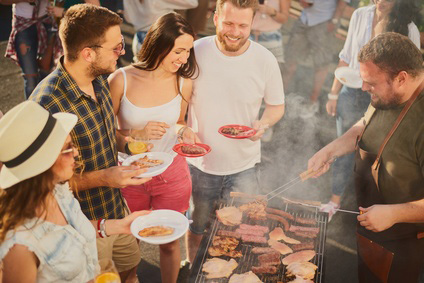 People grilling pictured. BBQ waste disposal